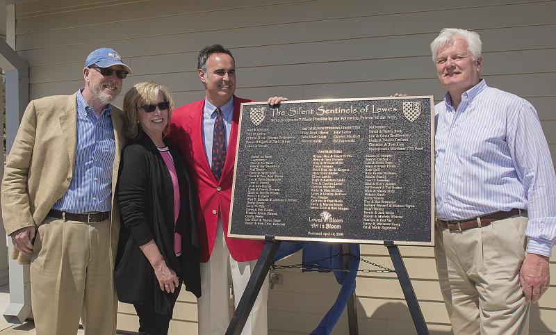 Major donors Paul Collins and Denise Bridgens (l-r) with Sen. Ernie Lopez, R-Lewes, and Mayor Ted Becker pose for a photo with the plaque.